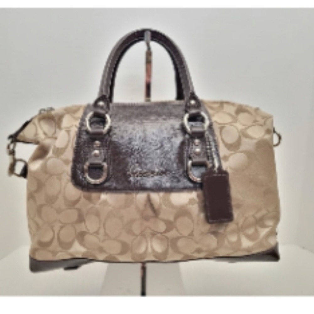 Authentic Coach satchel featuring the classic “C” jacquard pattern with dark bro